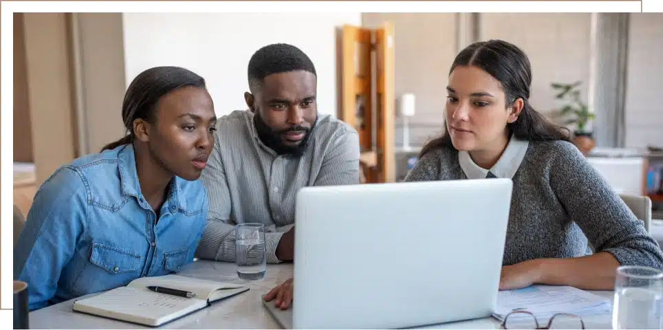 A couple meeting with a disability attorney